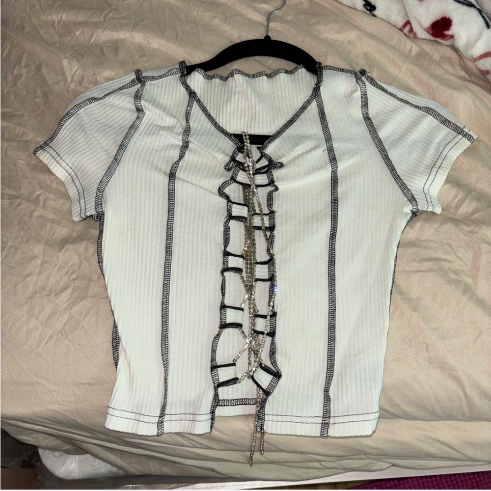 This beautiful shirt was only worn once it’s XS cute to go out.